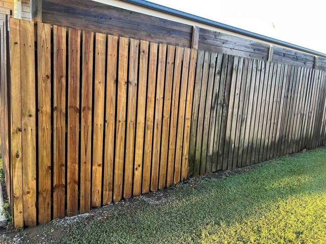 A timber fence line with the edge cut back along it
